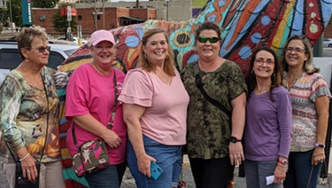 Jennifer L., Linda W., Jennifer C. enjoying a Club Social event with Puzzling Adventures.