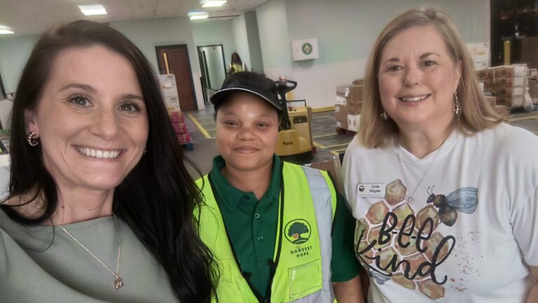 Lindsay & Linda W. with Harvest Hope employee when donating non-perishable food items collected for GFWC National Day of Service 2024.